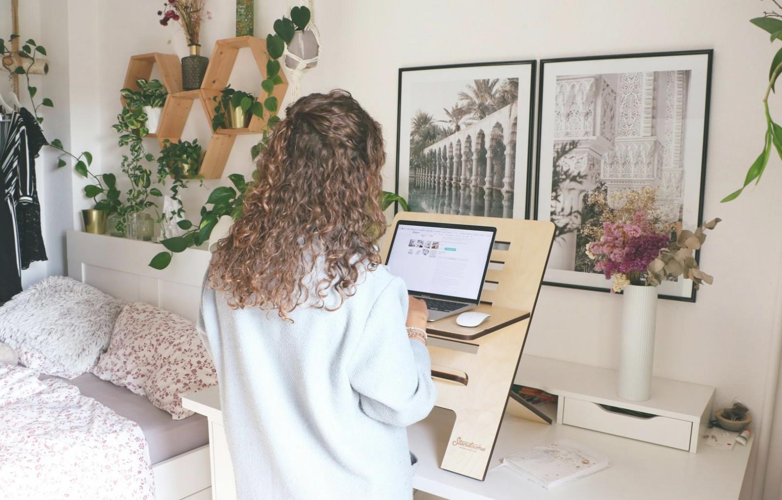 Professional color grading setup with multiple monitors showing before and after footage comparison